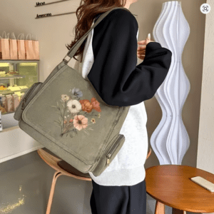 Beige schoudertas met bloemenprint